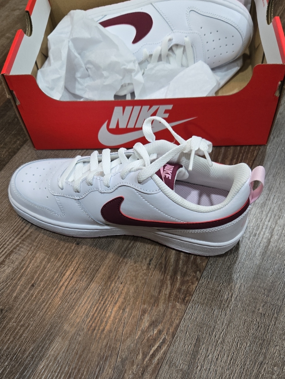 Nike White Sneakers with Maroon Swoosh and Pink Heel Tab